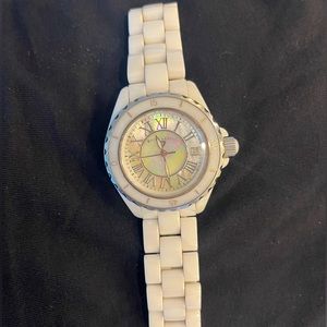 Swiss Legend Karamica round ladies watch. White with white mother of pearl face.